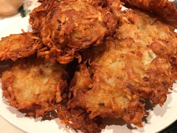 A pile of freshly made, crispy potato pancakes