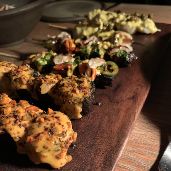 A colorful image of three types of skewers with vegetables and potatoes